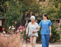 Caregiver and female older patient