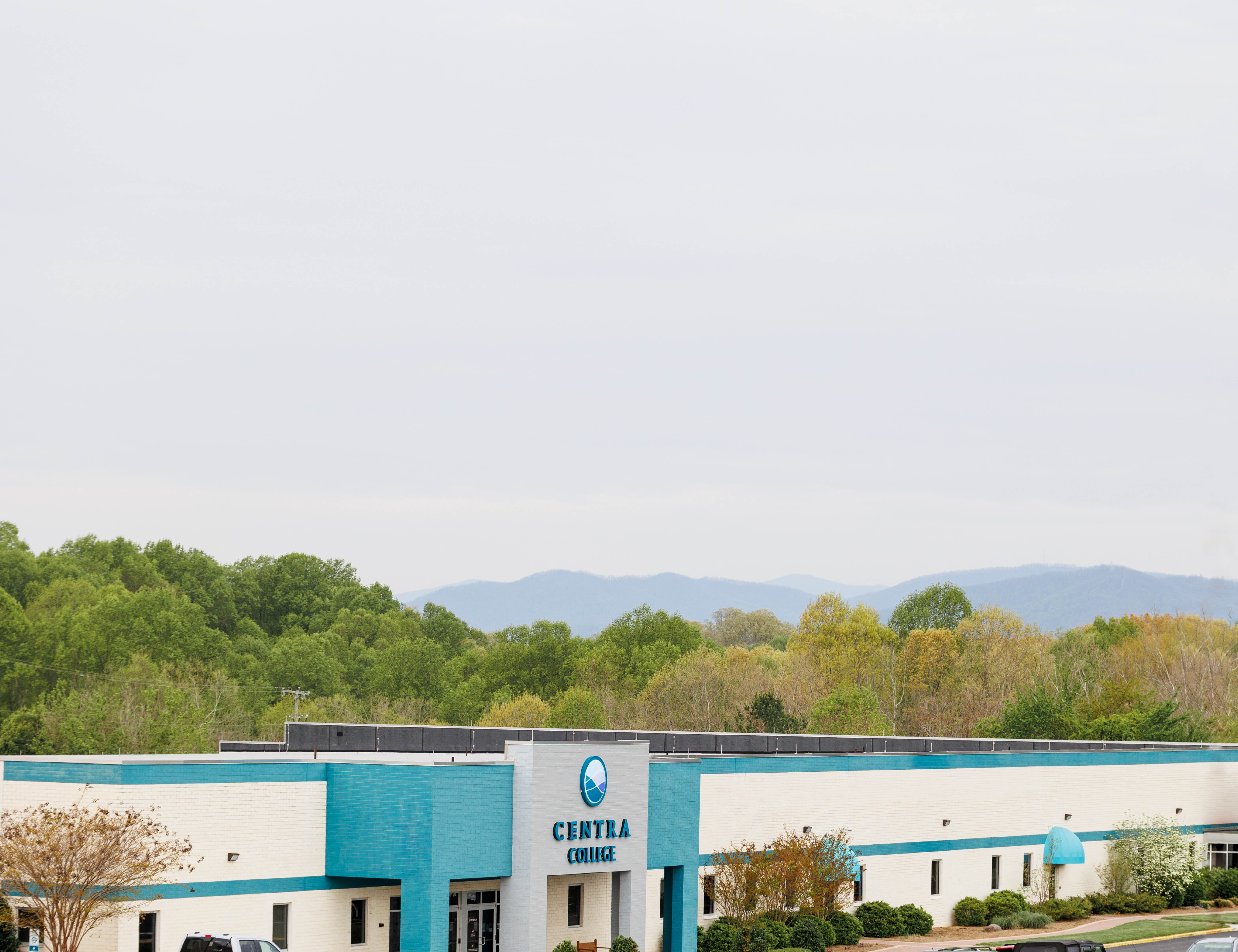 An overhead shot of Centra College with the Blue Ridge Mountains in the background.