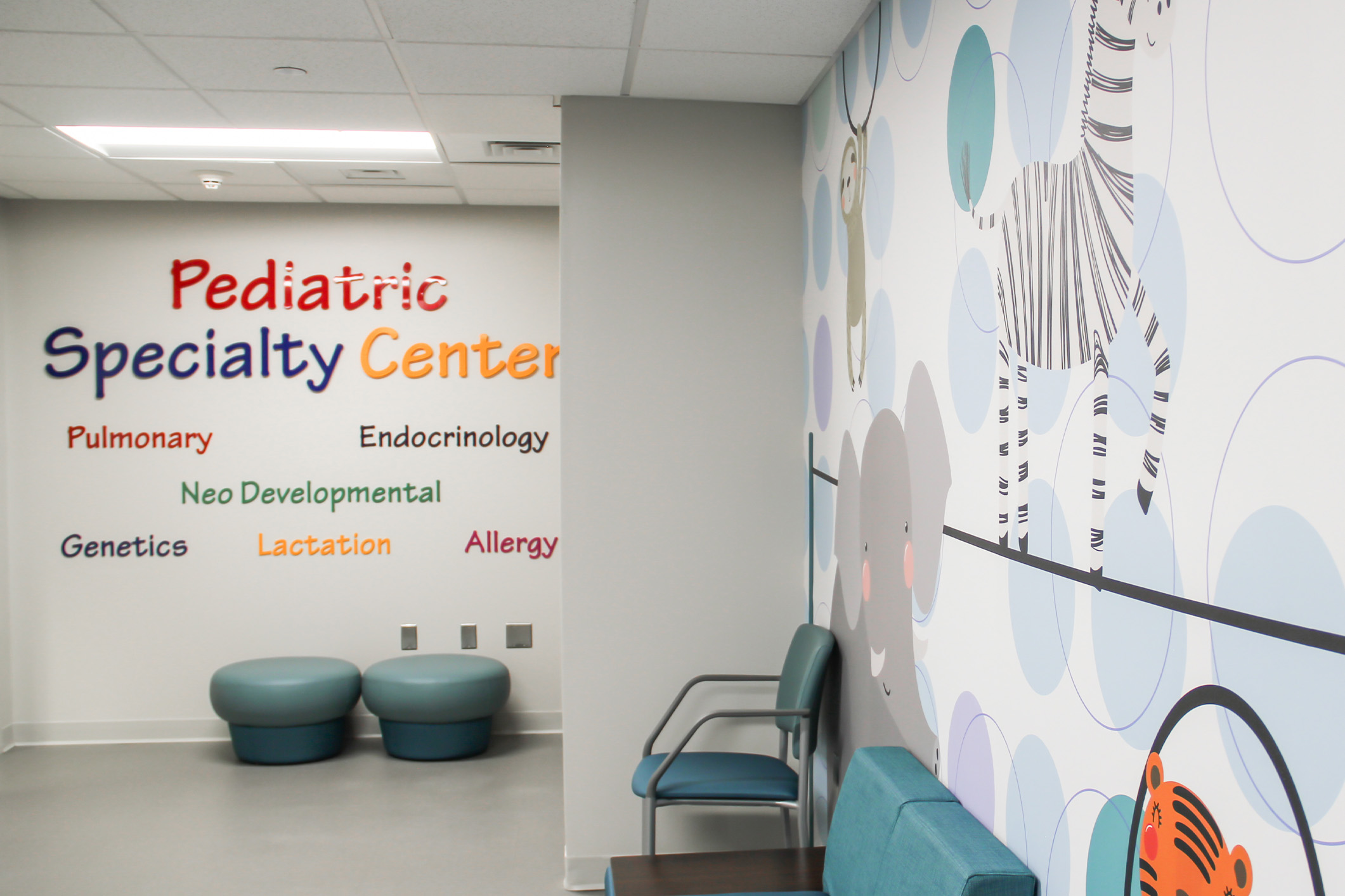 Children's Pediatric Speciality unit with baby animal wall artwork and murals