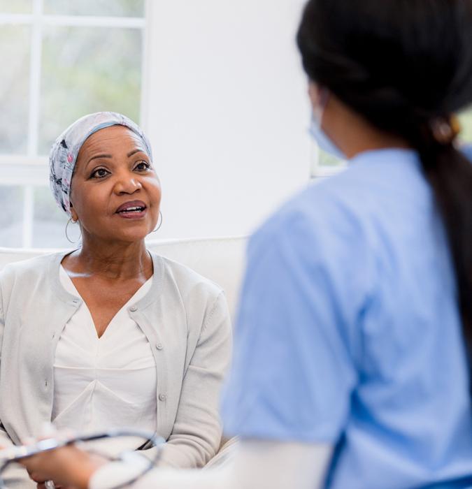 Oncology patient talking with a provider about treatment options