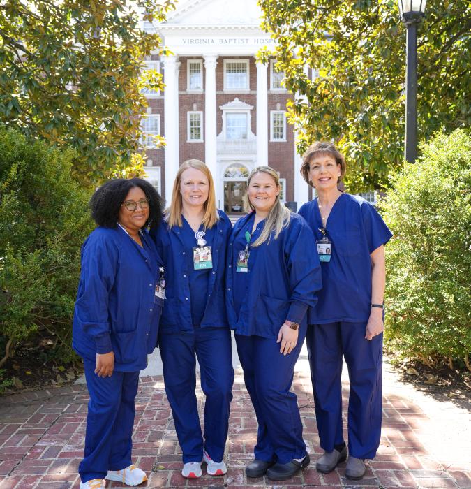 nurses standing outdoors 
